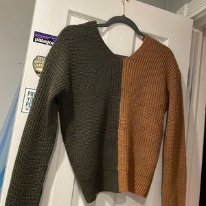 half dusty orange half green sweater
